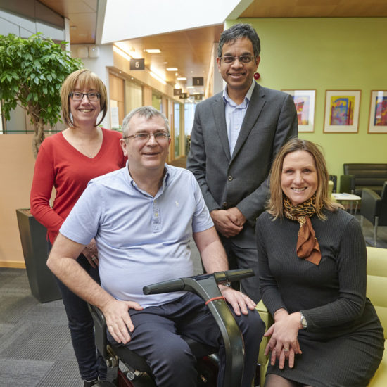 First trial participant Alan Gray with his wife Beverley alongside, Director of the MND-SMART Clinical Trial, Professor Siddharthan Chandran and MND Nurse Consultant, Judy Newton.