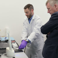 Adam Christie, CEO of Calcivis, pictured with
Ivan McKee  MSP, Minister for Trade, Investment and Innovation 
in the company lab at Edinburgh BioQuarter.

Photo by Phil Wilkinson